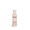 A 50ml bottle of NEOM Super Shower Power Body Cleanser with a white label and pink packaging.