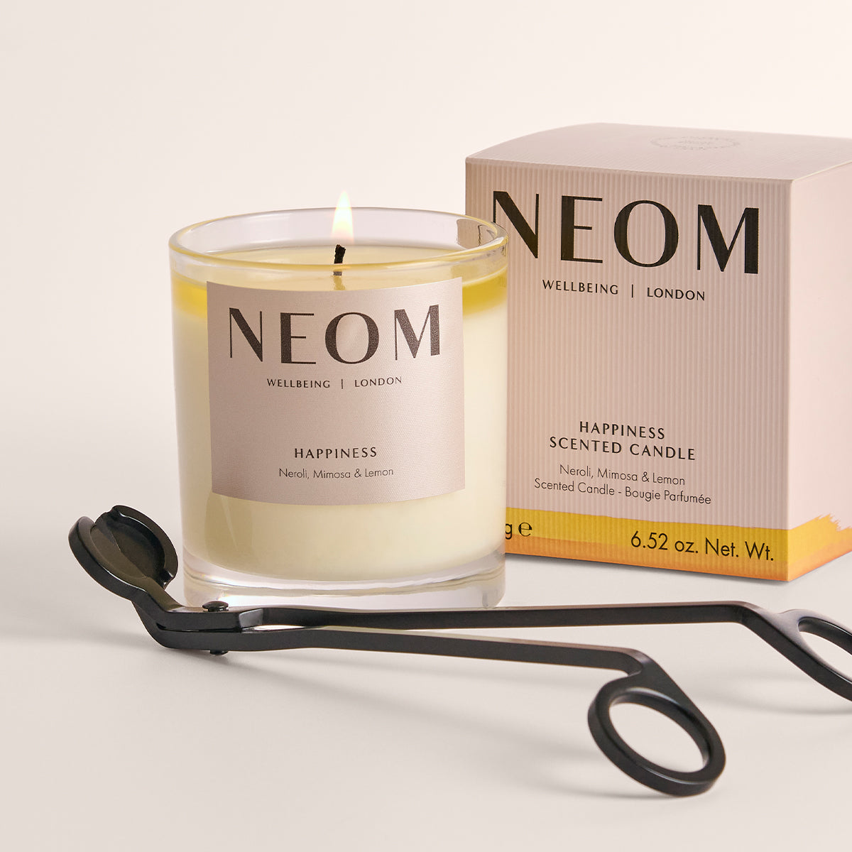 NEOM Happiness scented candle with wick trimmer for candle care and home fragrance