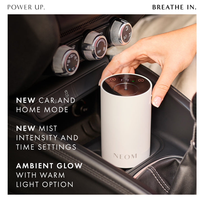Neom diffuser being used in a car with text highlighting features.
