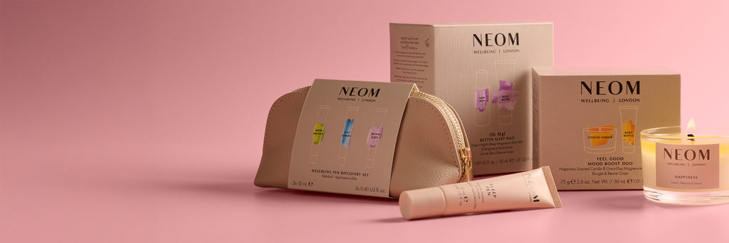 NEOM gift sets on a pink background