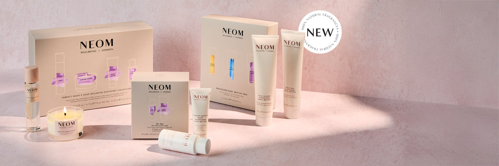 NEOM gift sets on a light pink background with 'New' label.