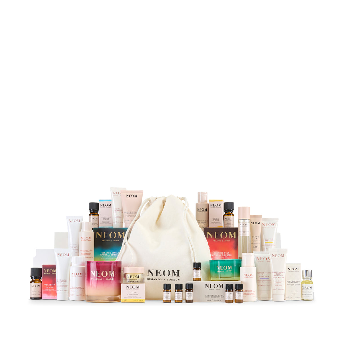 Collection of NEOM skincare and wellness products on a white background