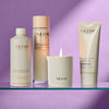 NEOM products including bath foam, bath milk, body butter, and candle on a purple background