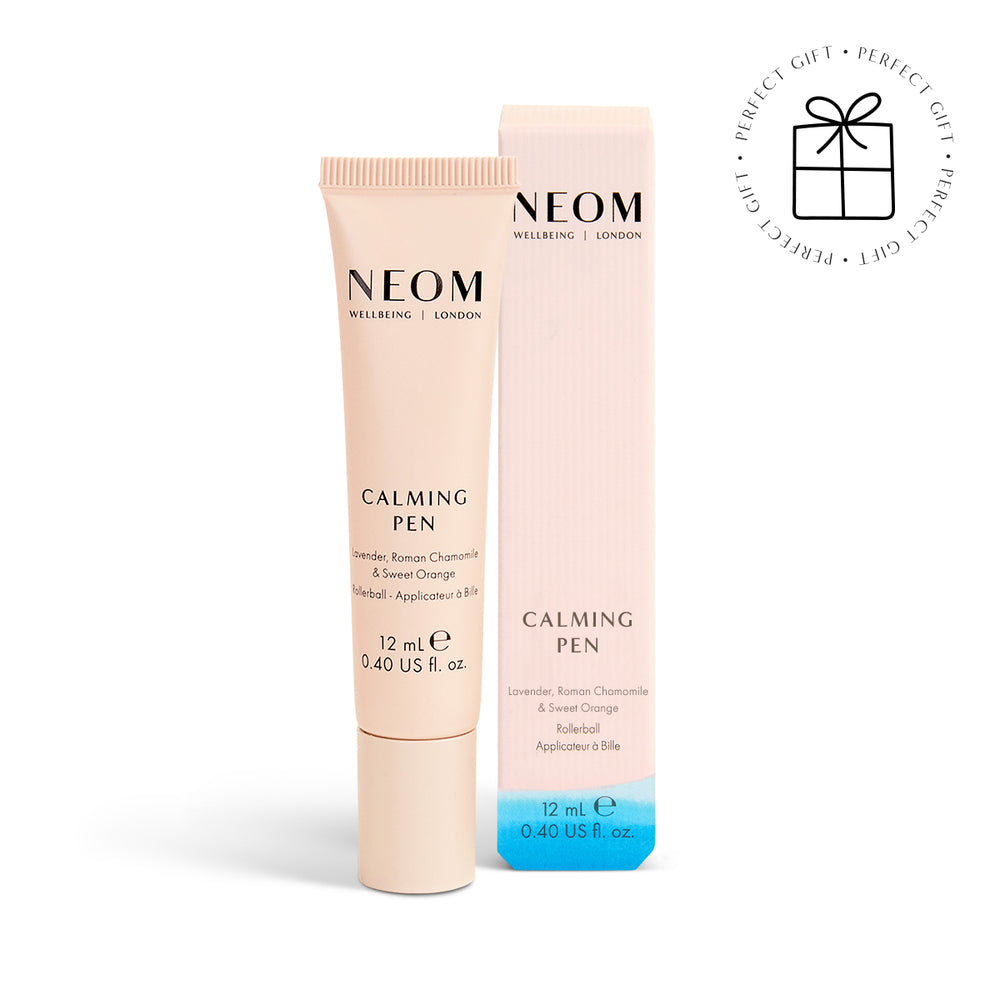 NEOM Calming Pen with packaging on a white background with a Perfect Gift roundel with a present