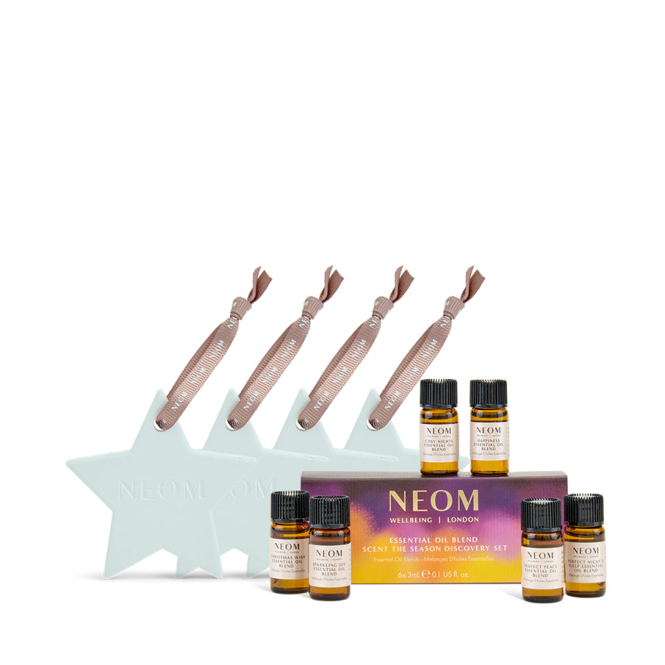 NEOM essential oil set with star-shaped diffusers on a white background