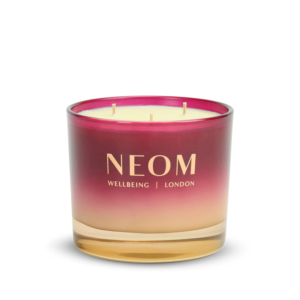 NEOM Christmas Wish 3 Wick Scented Candle with a gradient design on a white background