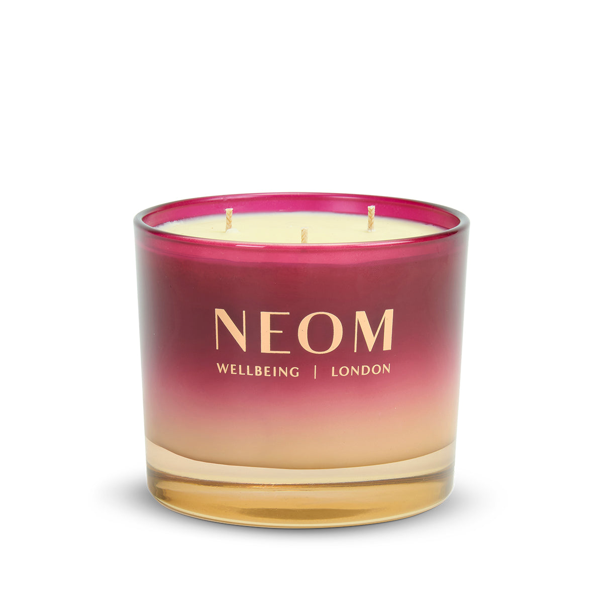 NEOM Christmas Wish 3 Wick Scented Candle with a gradient design on a white background