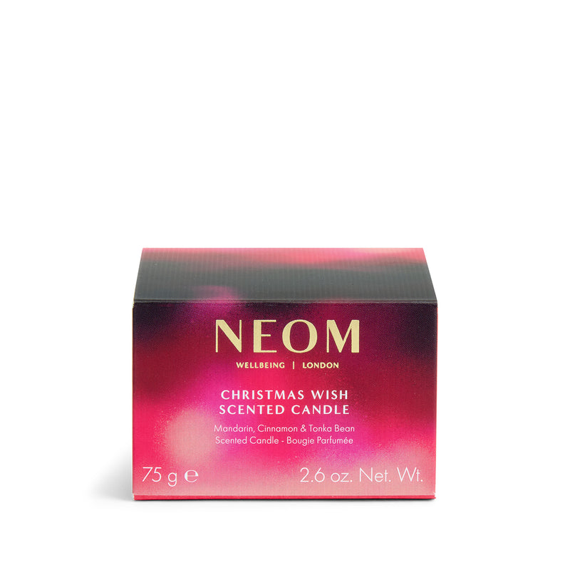 NEOM Christmas Wish Travel Scented Candle packaging on a white background