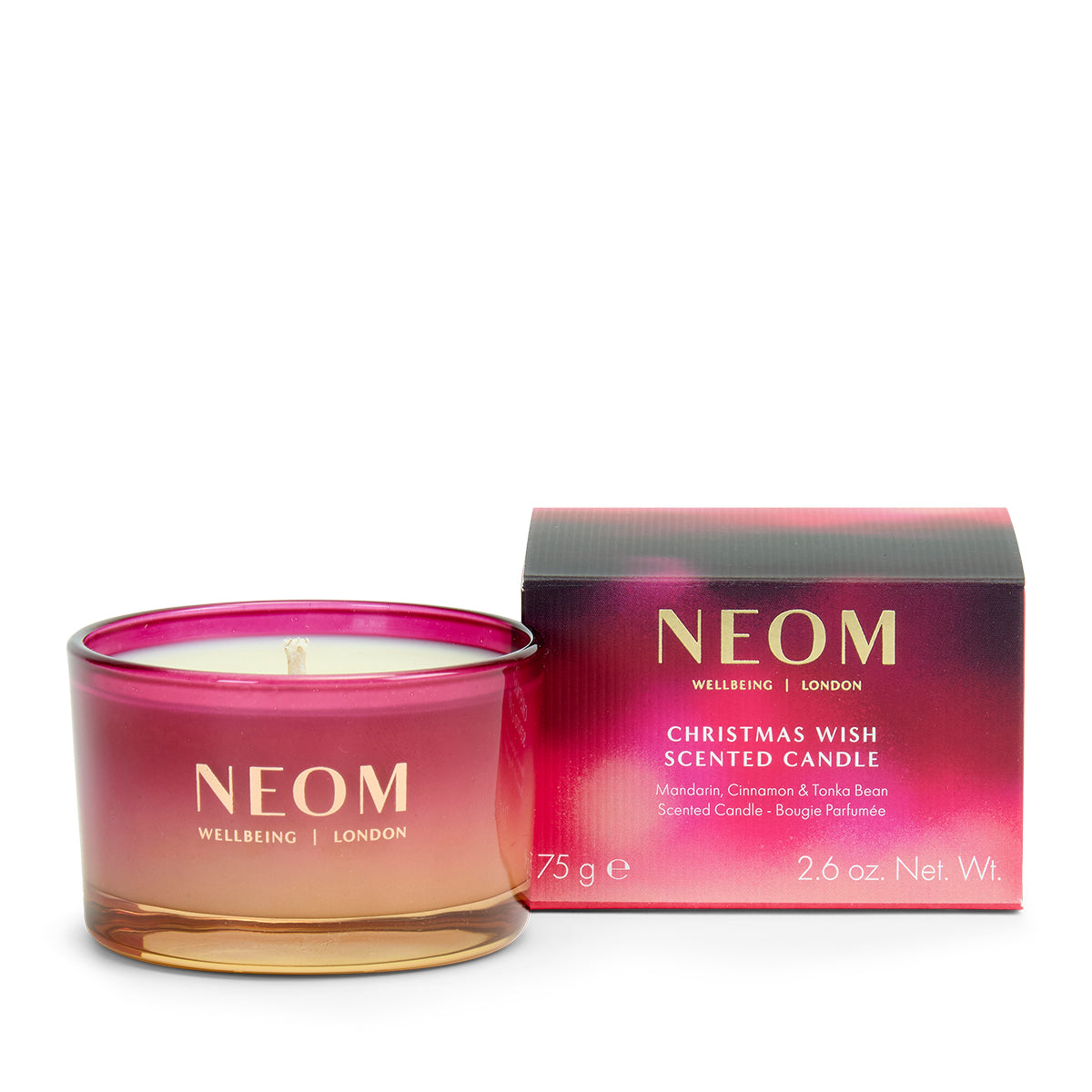 NEOM Christmas Wish Travel Scented Candle with packaging on a white background