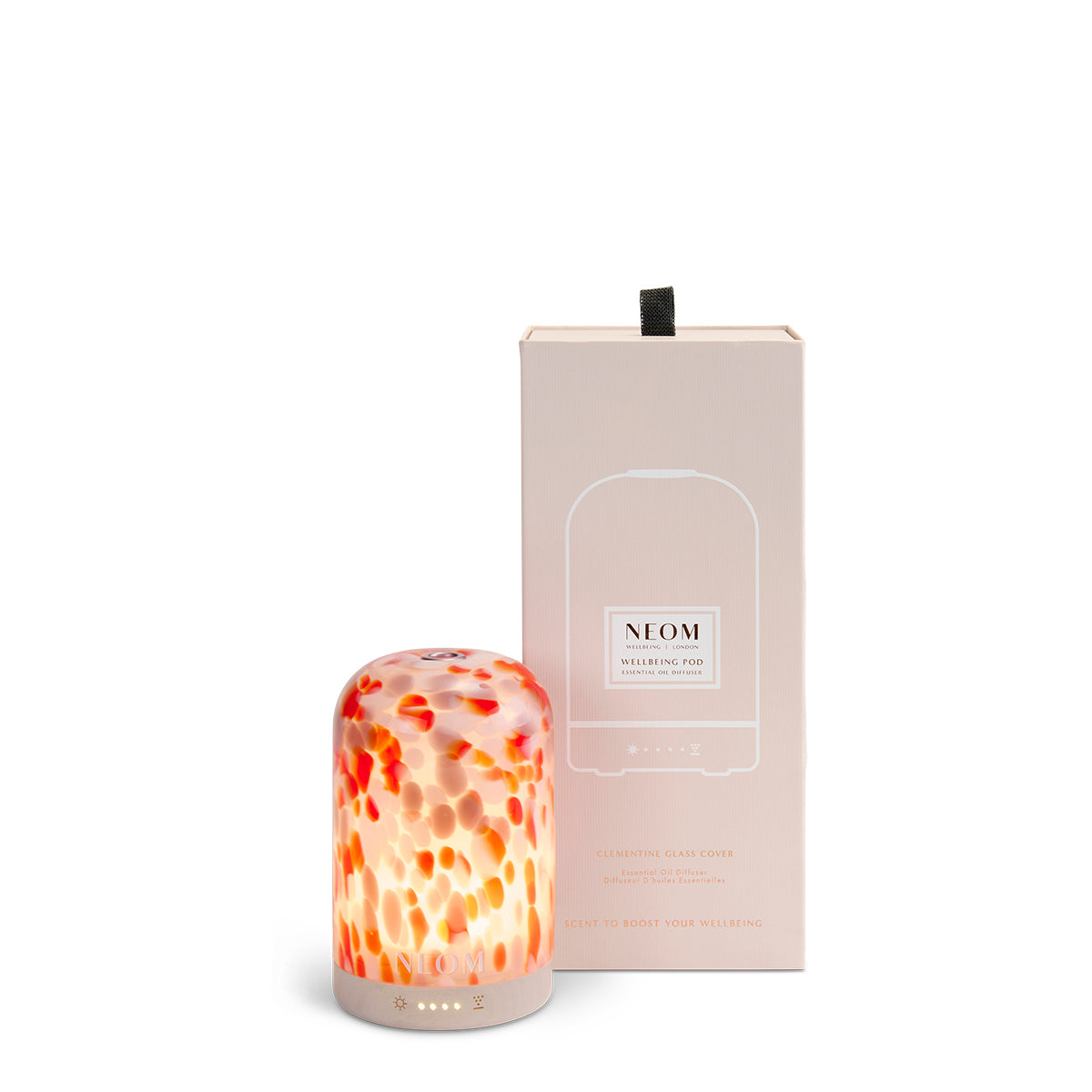 NEOM diffuser with a colorful design next to its packaging on a white background