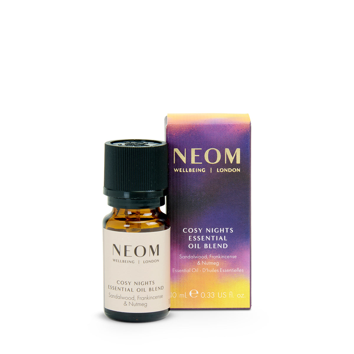 Neom Cosy Nights essential oil blend bottle and packaging on a white background