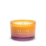 NEOM Cosy Nights Travel Scented Candle with gradient orange to pink design on a white background