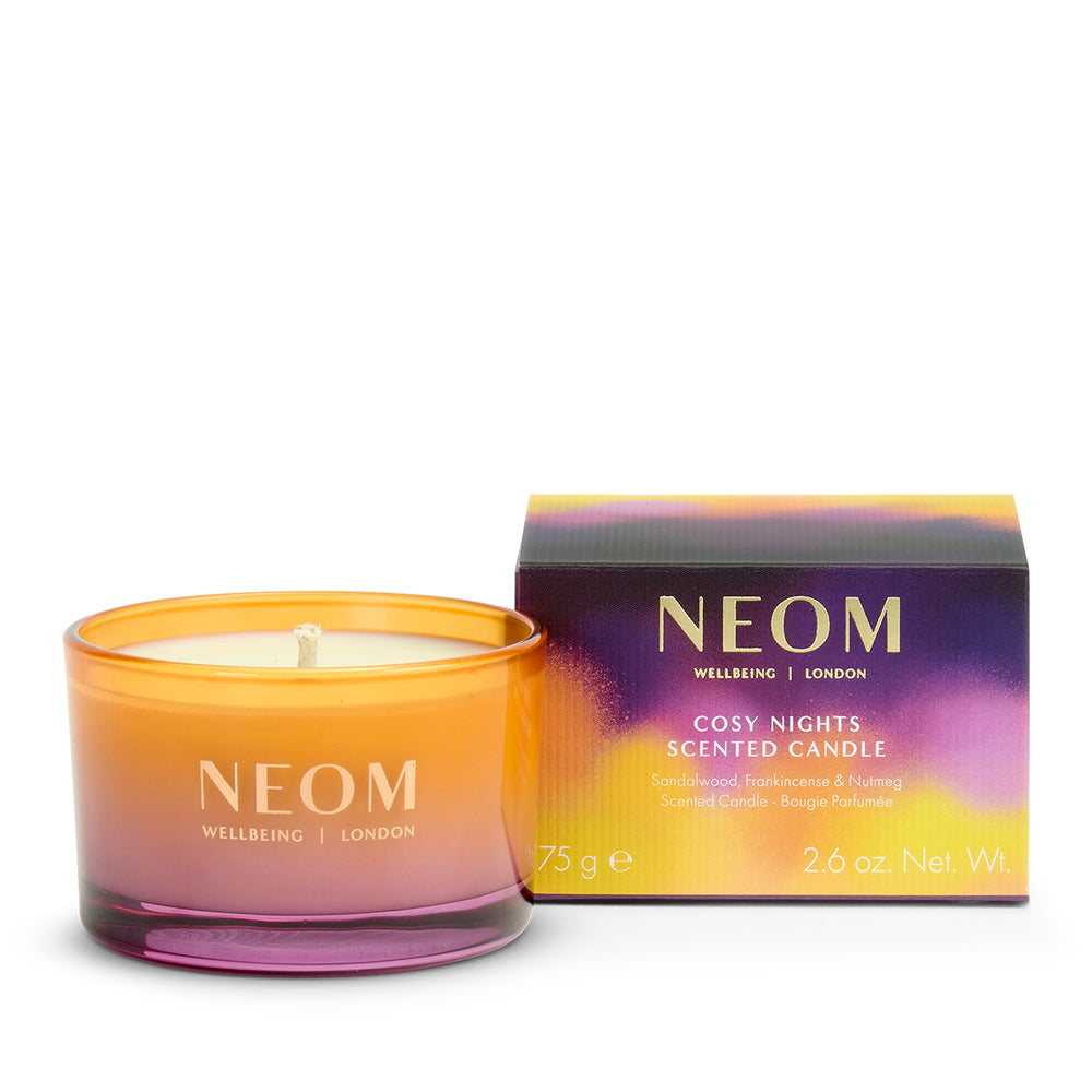 NEOM Cosy Nights Travel Scented Candle with packaging on a white background
