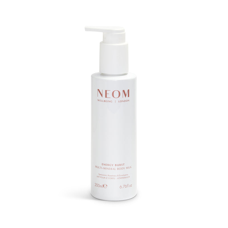 NEOM body milk bottle on a white background