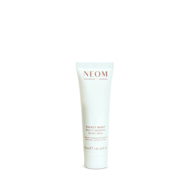 NEOM body milk tube on a white background