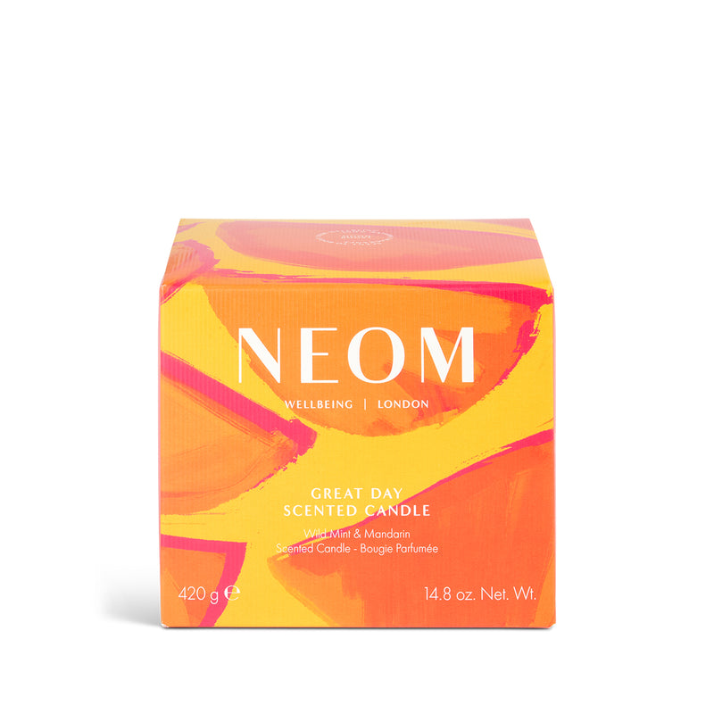 NEOM scented candle box with abstract design on a white background