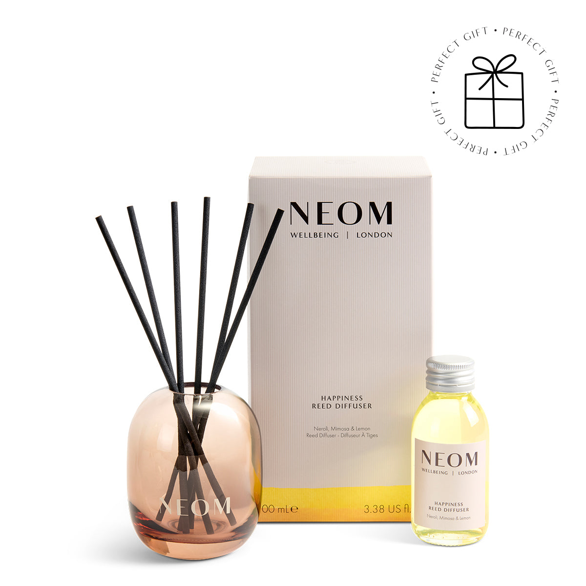 NEOM Happiness Reed Diffuser set with packaging on a white background