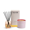 NEOM Happiness reed diffuser and it's all rosy 3 wick candle on a white background