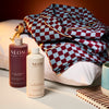 NEOM feeling grounded body wash and real luxury magnesium bath milk 