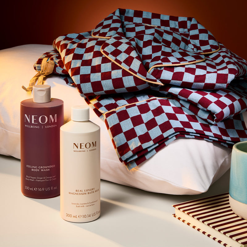 NEOM feeling grounded body wash and real luxury magnesium bath milk 