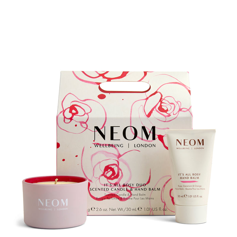 NEOM products including a candle, hand balm, and packaging on a white background
