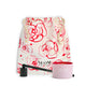 NEOM It's All Rosy candle, wick trimmer, and branded drawstring bag.