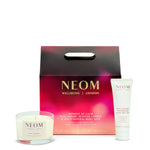 NEOM candle and body set with packaging on a white background