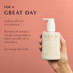 NEOM Great Day Hand Lotion with wild mint and mandarin, moisturizing natural skincare in hand