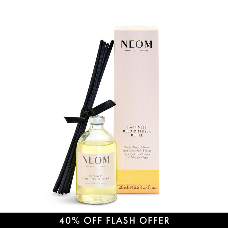 NEOM Happiness Reed Diffuser Refill with packaging on a white background