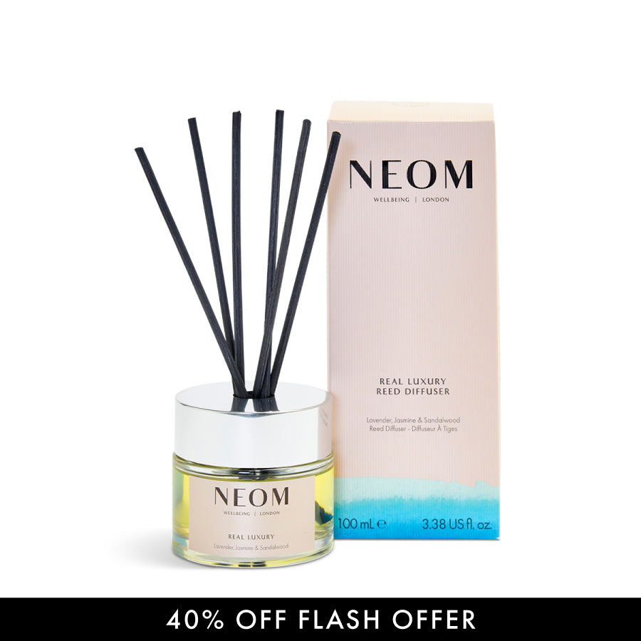NEOM real luxury reed diffuser with packaging on a white background