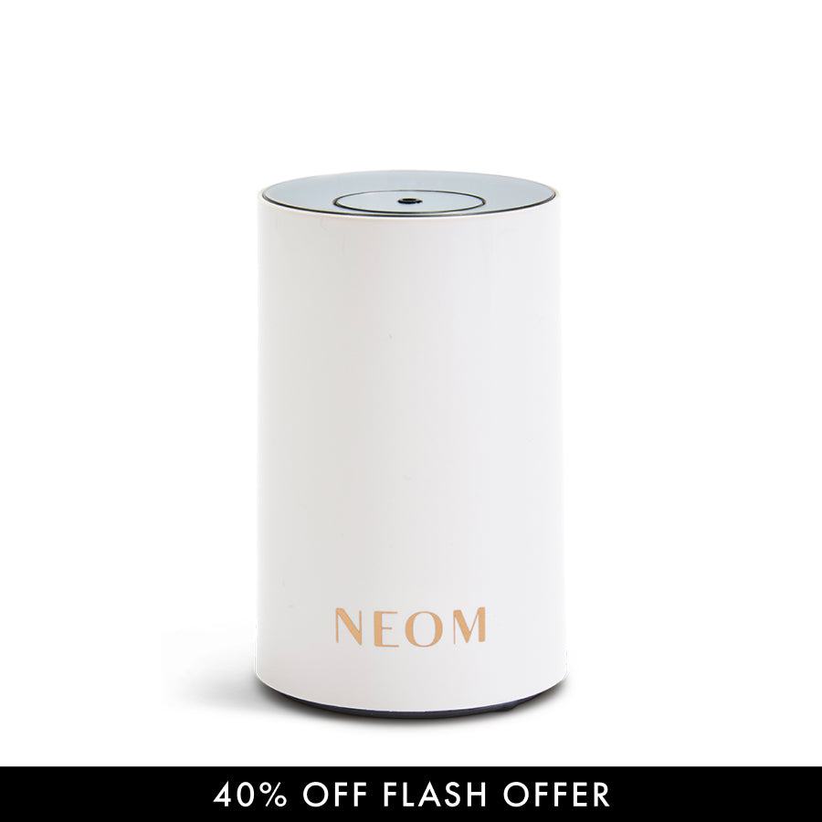 Pod Mini Diffuser with 'NEOM' branding on a light gray background