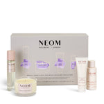 NEOM sleep wellbeing collection with various products on a white background