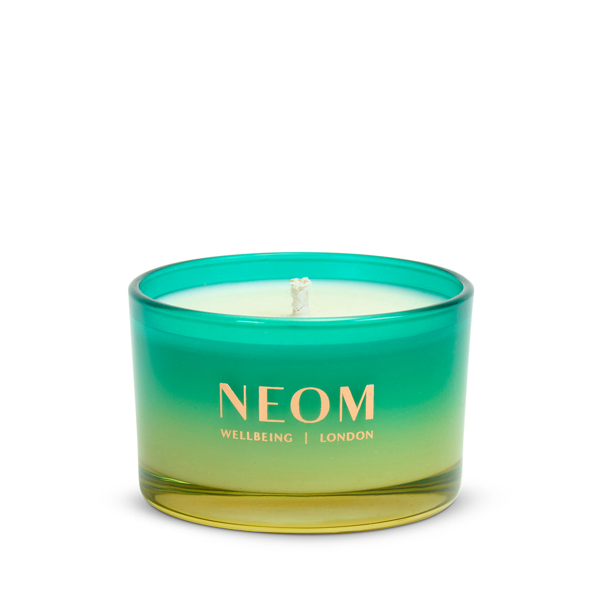 NEOM Perfect Peace Travel Scented Candle with gradient green and yellow design on a white background