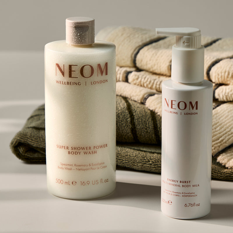 NEOM super shower power body wash and energy burst multi mineral milk 