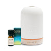 Neom diffuser and essential oil set on a white background