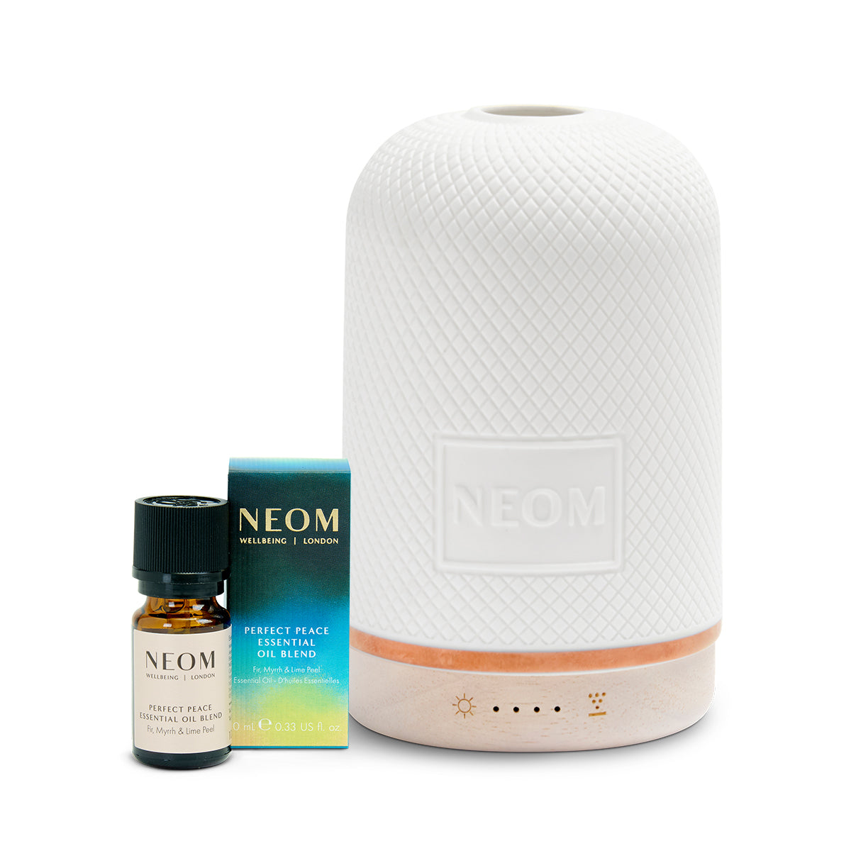 Neom diffuser and essential oil set on a white background