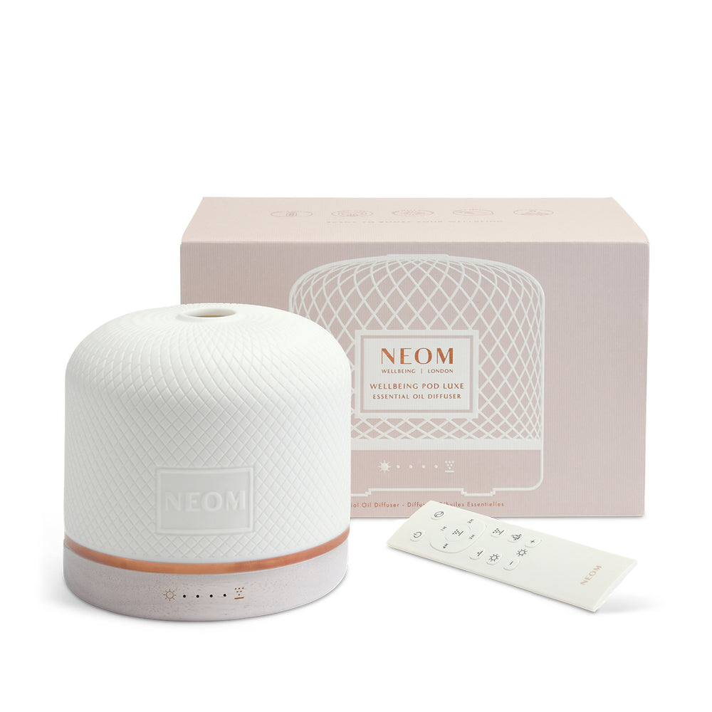 Neom diffuser with packaging on a white background