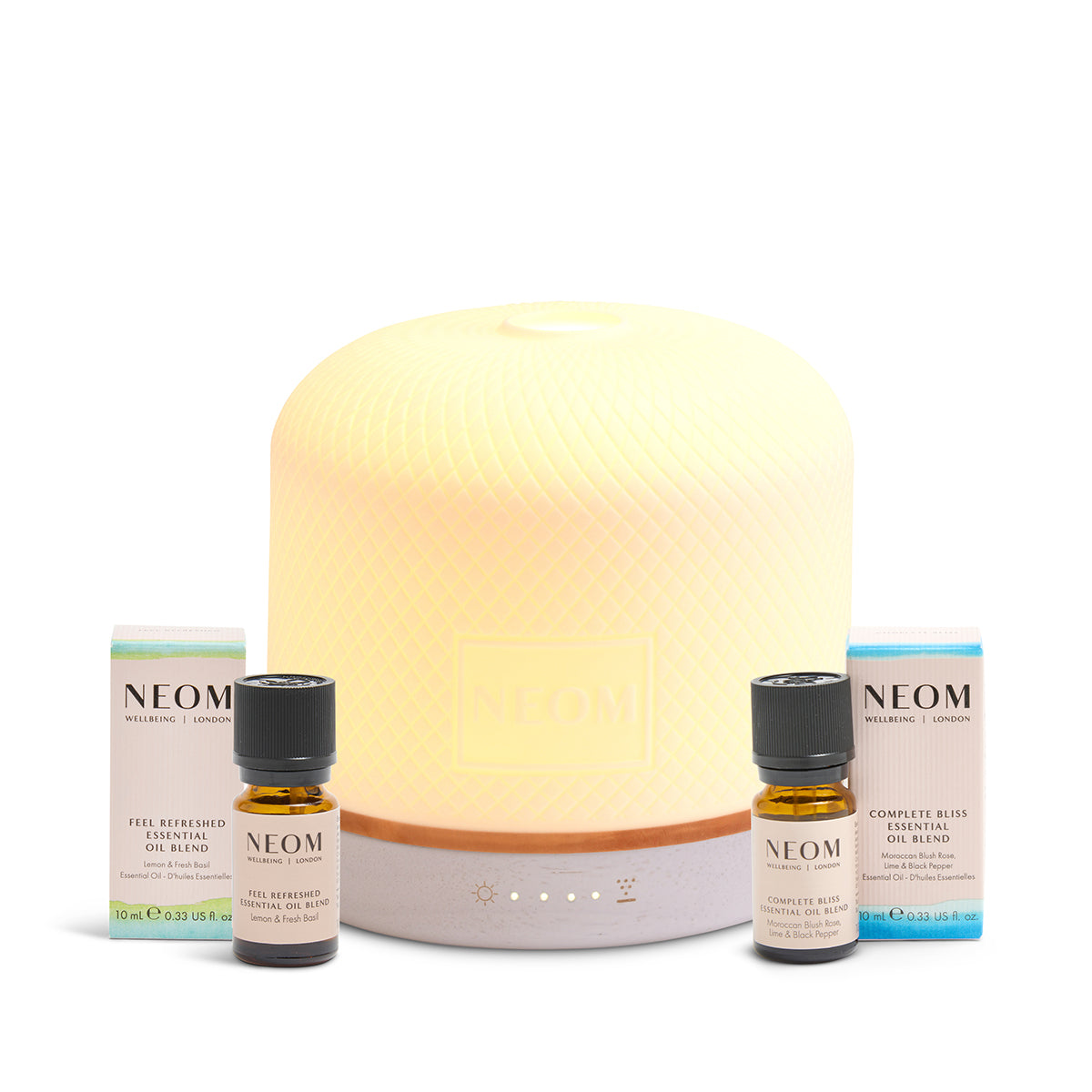 NEOM pod luxe diffuser with 2 essential oil blends on a white background