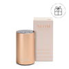NEOM pod mini in rose gold on a white background with a Perfect Gift Roundel with a present
