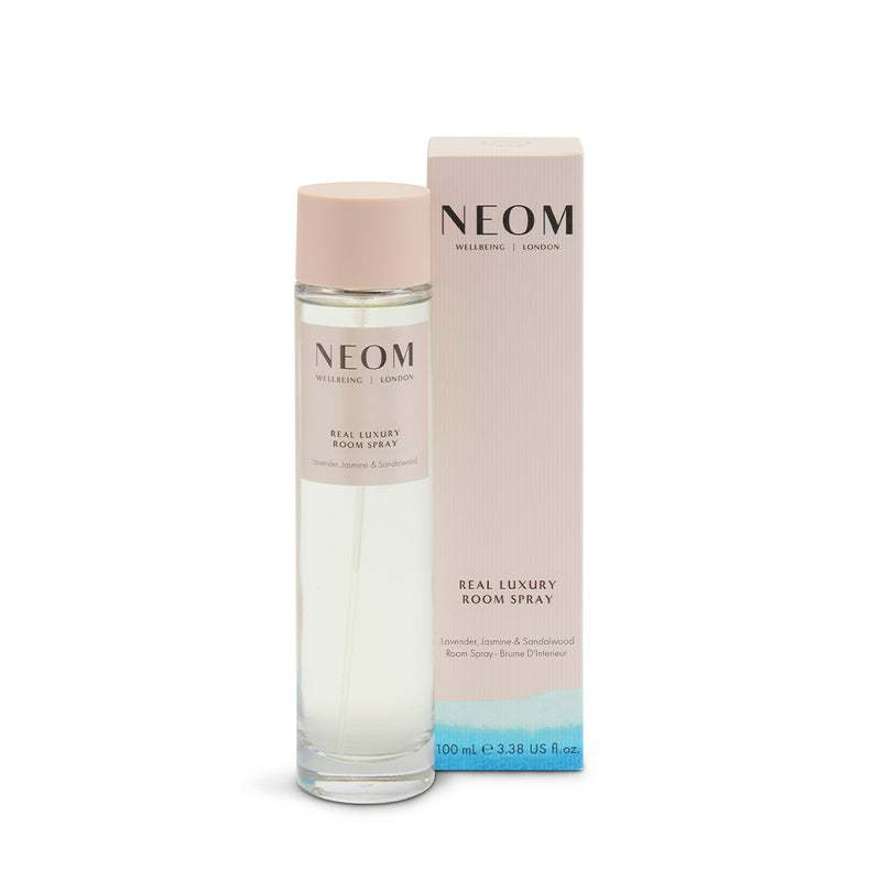NEOM Real Luxury Room Spray bottle and packaging on a white background
