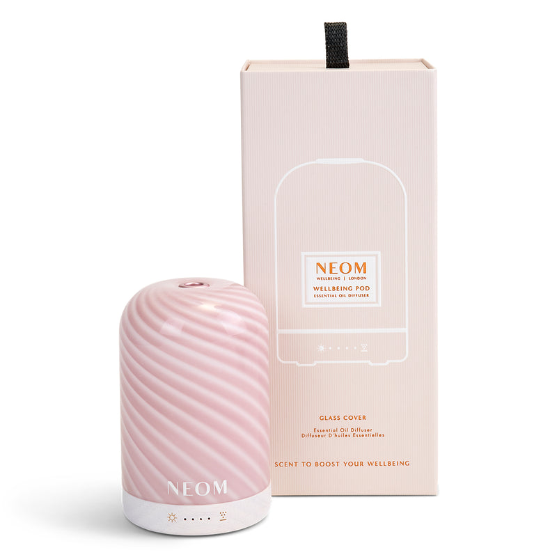 NEOM raspberry ripple essential oil diffuser on a white background