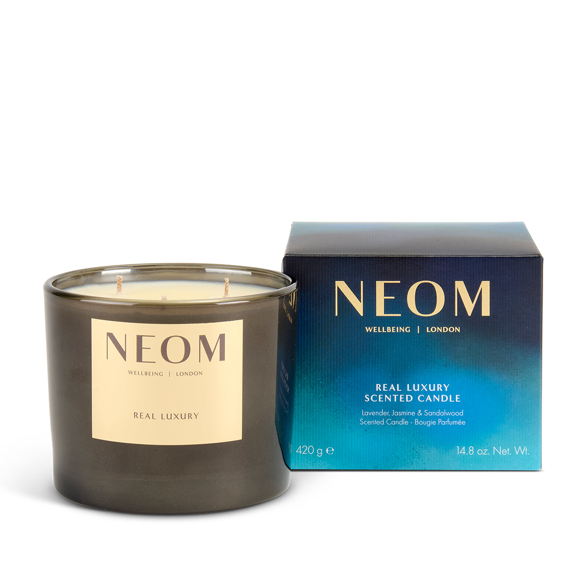 NEOM limited edition Real Luxury candle and box on a white background