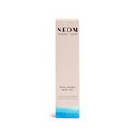 NEOM Real Luxury Body Oil packaging on a white background