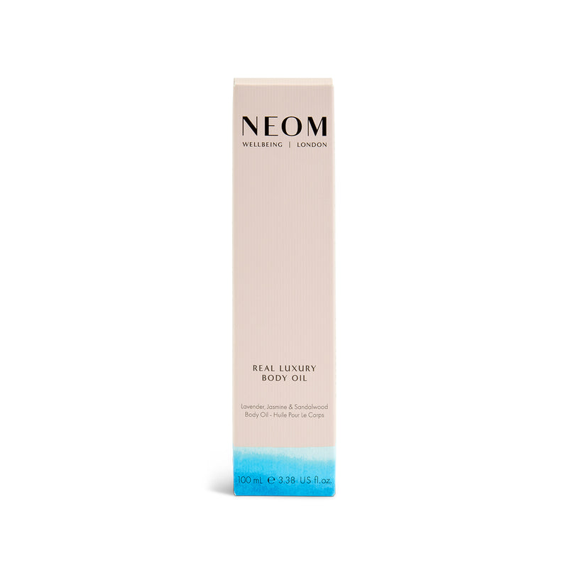 NEOM Real Luxury Body Oil packaging on a white background