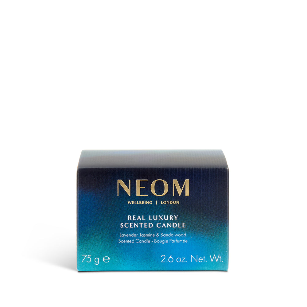 NEOM real luxury scented travel candle packaging on a white background