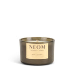 NEOM limited edition real luxury scented travel candle with a gold label on a white background