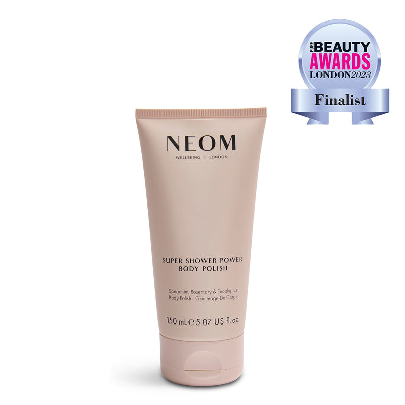 NEOM Super Shower Power Body Polish tube with Beauty Awards London 2023 finalist badge on a white background