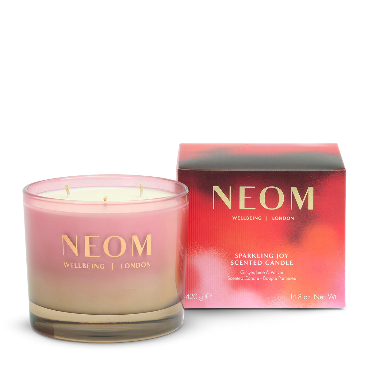 NEOM Sparkling Joy 3 Wick Scented Candle and packaging on a white background