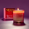 NEOM candle and packaging on a purple background