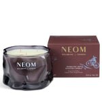 3 wick candle in brown glass and brown packaging